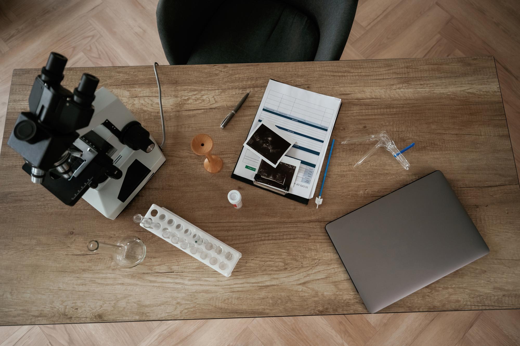 Studio table with organized production samples